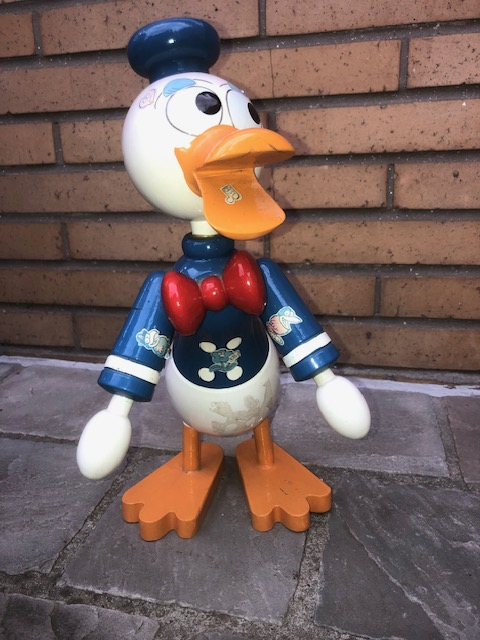 Houten Donald Duck spaarpot, Franse origine