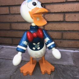 Houten Donald Duck spaarpot, Franse origine